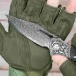 TOSAHWI Handmade Damascus Steel Folding Knife with Textured Purple Ebony Handle - Image 2