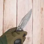 TOSAHWI Handmade Damascus Steel Folding Knife with Textured Purple Ebony Handle - Image 3