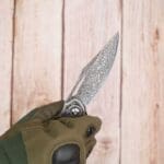 TOSAHWI Handmade Damascus Steel Folding Knife with Textured Purple Ebony Handle - Image 3