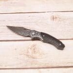 TOSAHWI Handmade Damascus Steel Folding Knife with Textured Purple Ebony Handle - Image 6