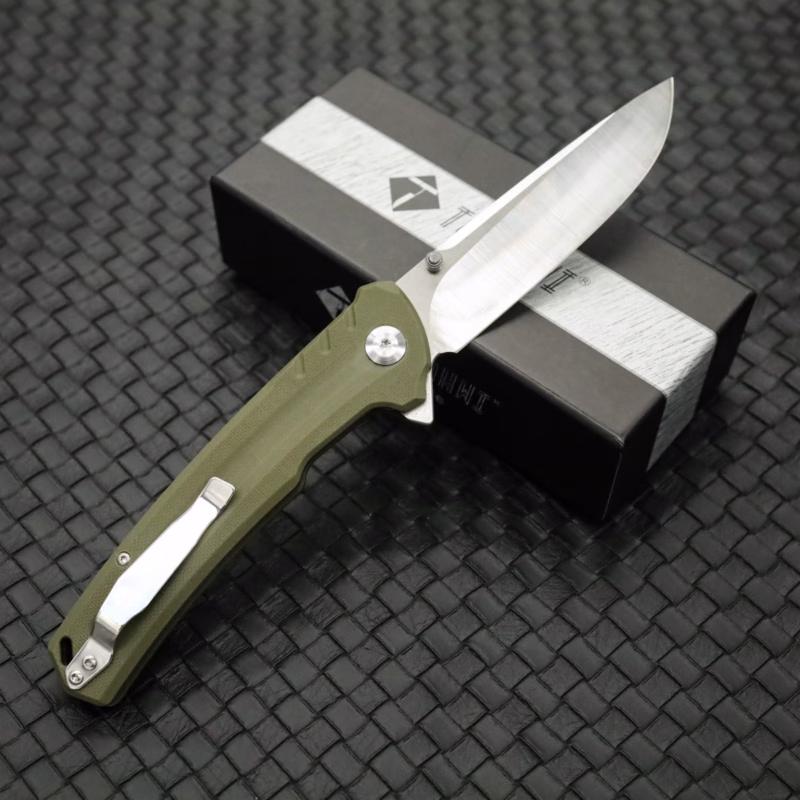 Tosahwi green G10 folding pocket knife with presentation box